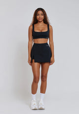SHORT SAIA COM FENDA MINIMAL PRETO